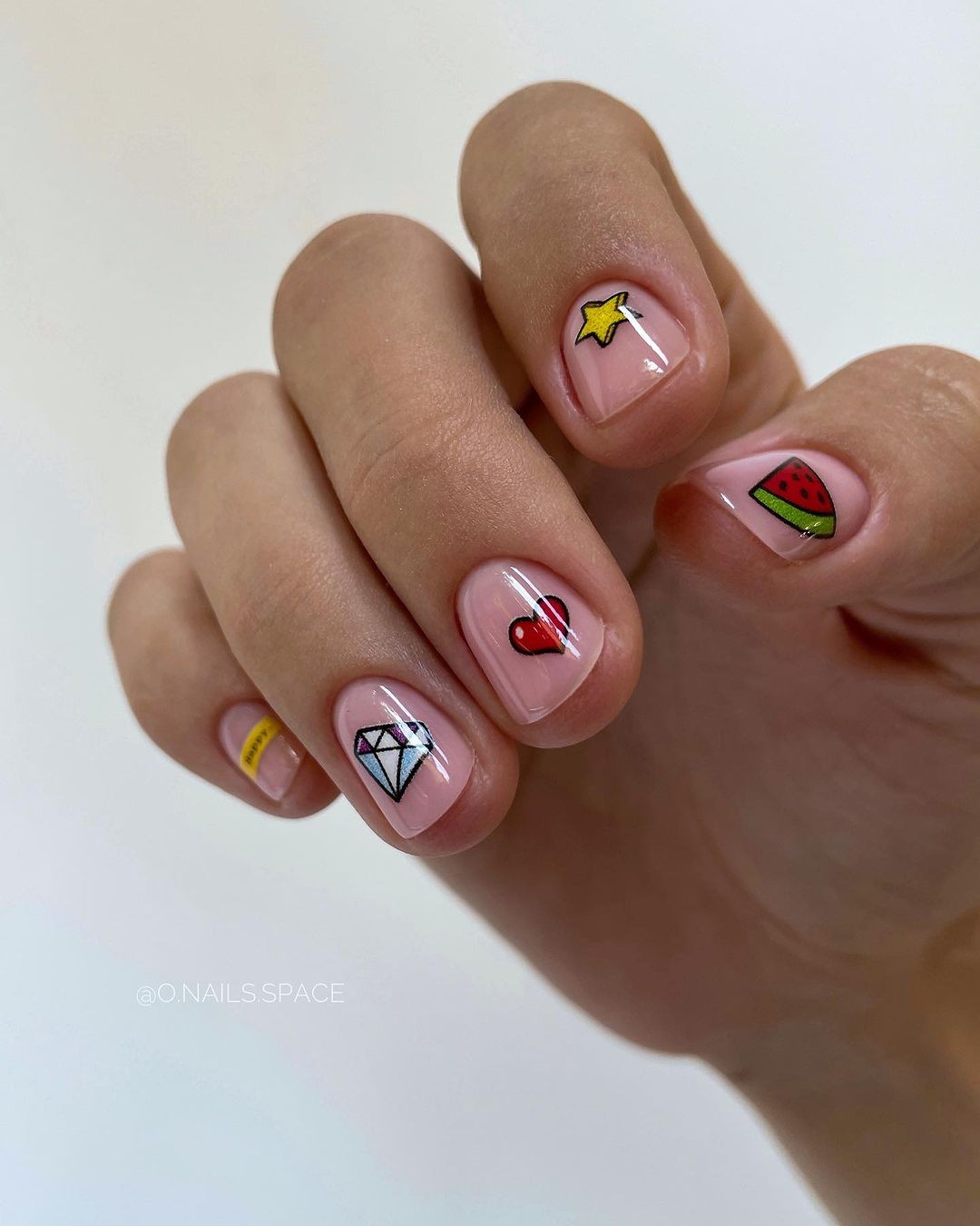 Sheer Pink Nails Adorned with Cute Illustrations