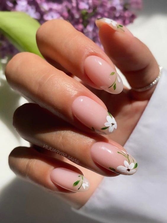 French Nails with Floral Accents: