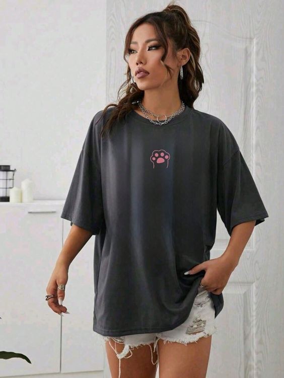 An Oversized Black Tee with a Pink Paw Print