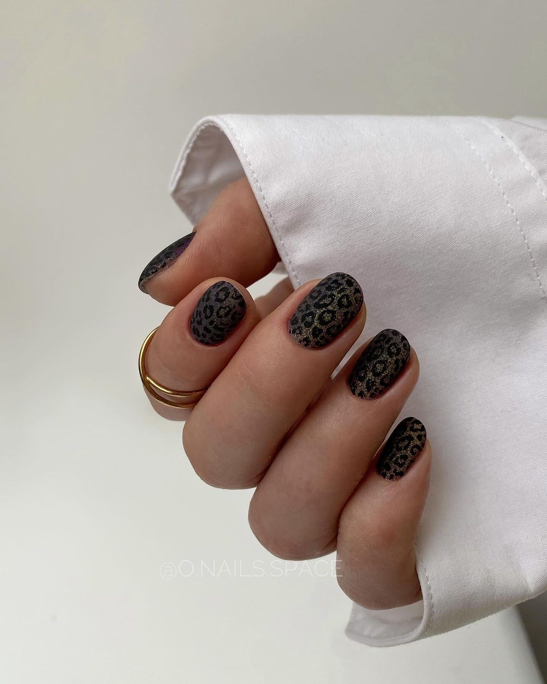 Black Nails with a Leopard Print Design