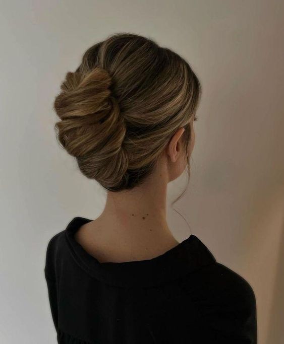 Soft Updo with Floral Adornment