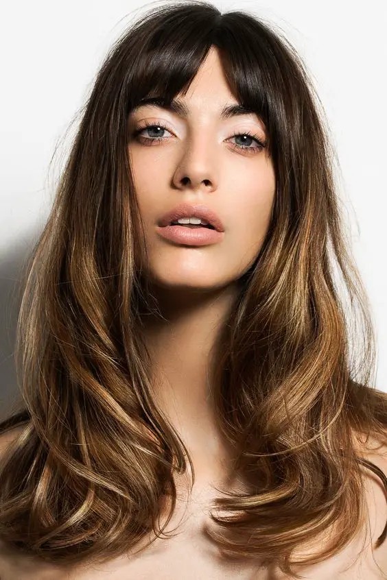 Blunt Bangs with Long Layers: