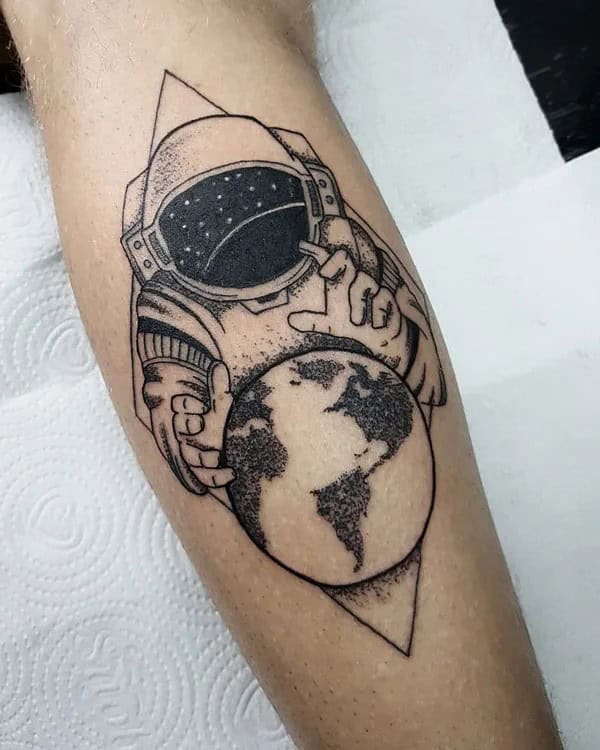 Astronaut Holding Earth Tattoo