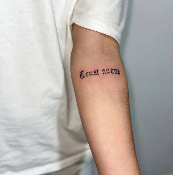 Small “Trust No One” Tattoo