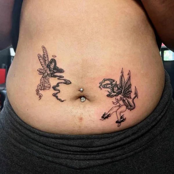 Angel Vs Demon Stomach Tattoo