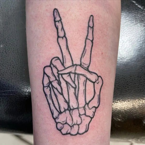 Outline Skeleton Hand Tattoo