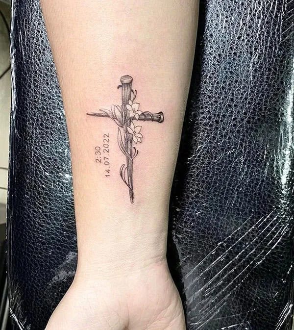 Nail Cross Tattoo on Wrist