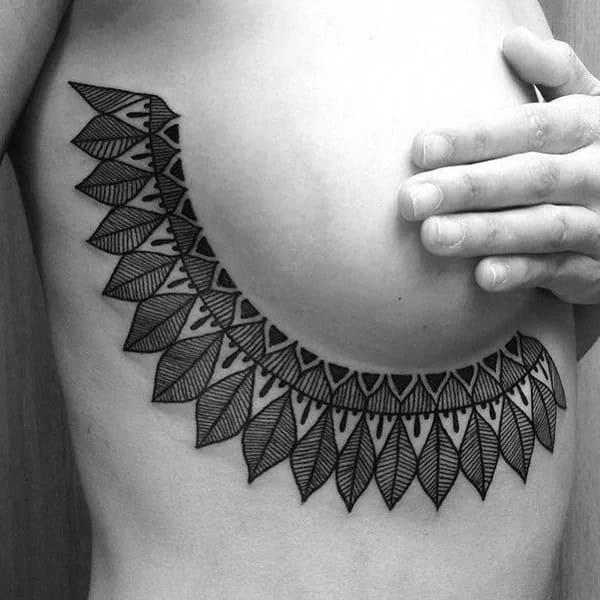 Tribal Tattoo Under Breast