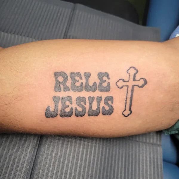 Cross Bicep Tattoo