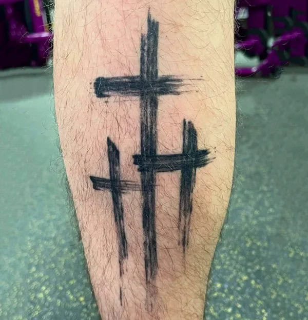 3 Cross Leg Tattoo