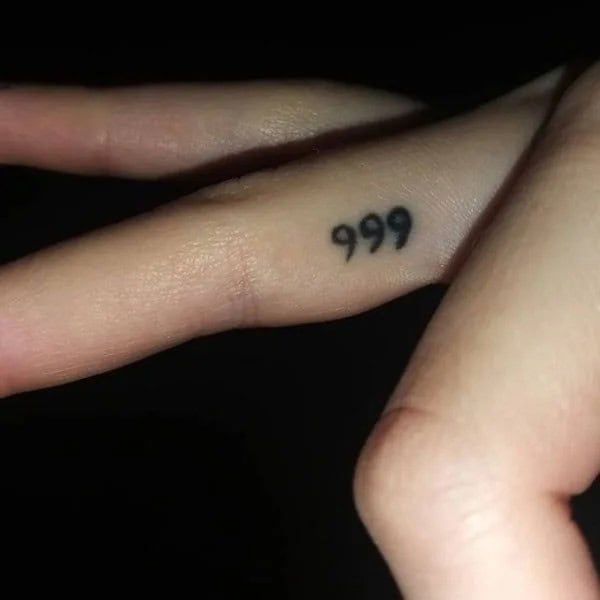 999 Tattoo on Finger