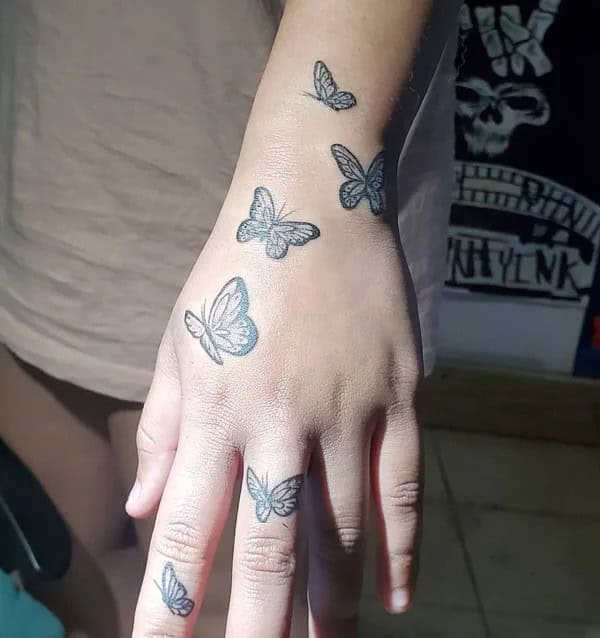 Semicolon Butterfly Hand Tattoo