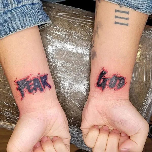 Fear God Tattoo on Wrist