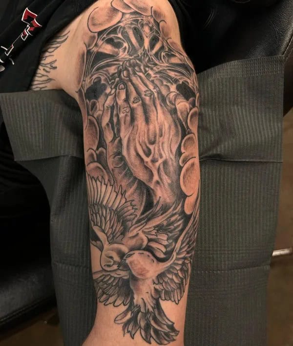 Praying Hands Arm Tattoo