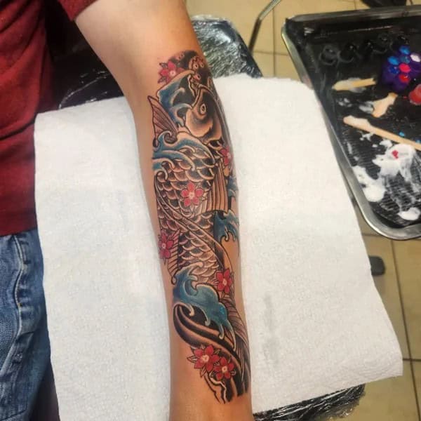 Koi Fish Forearm Tattoo