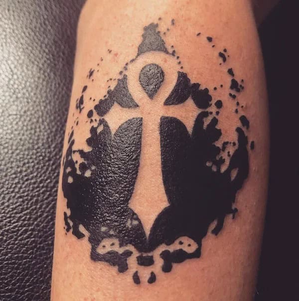 Ankh Negative Space Tattoo