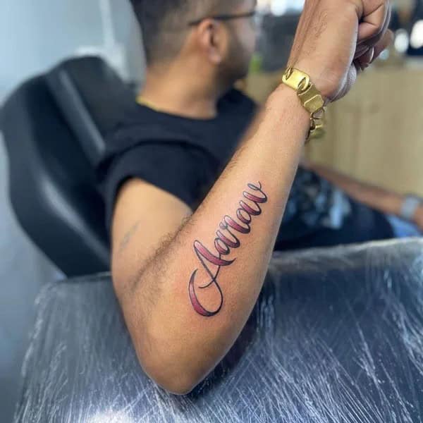 Forearm Name Tattoo