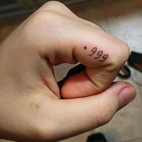 999 Tattoo on Finger