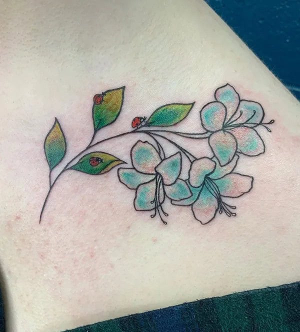 Honeysuckle and Ladybugs Tattoo