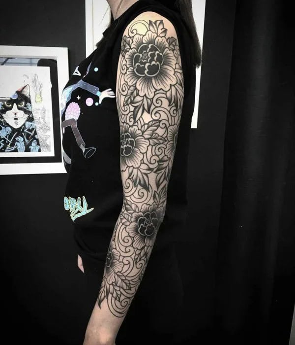 Blackwork Flower Sleeve Tattoo