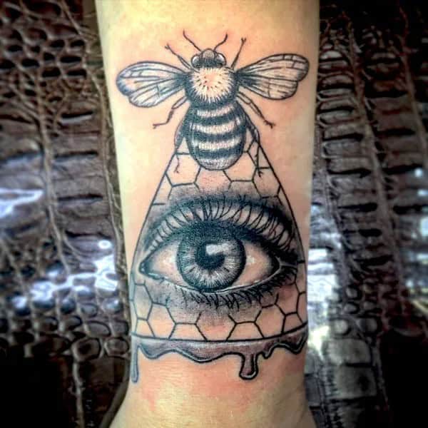 Egyptian Bee/ Bee tattoo with Illuminati