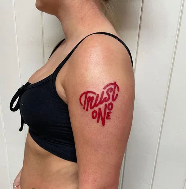 Heart Shaped “Trust No One” Tattoo