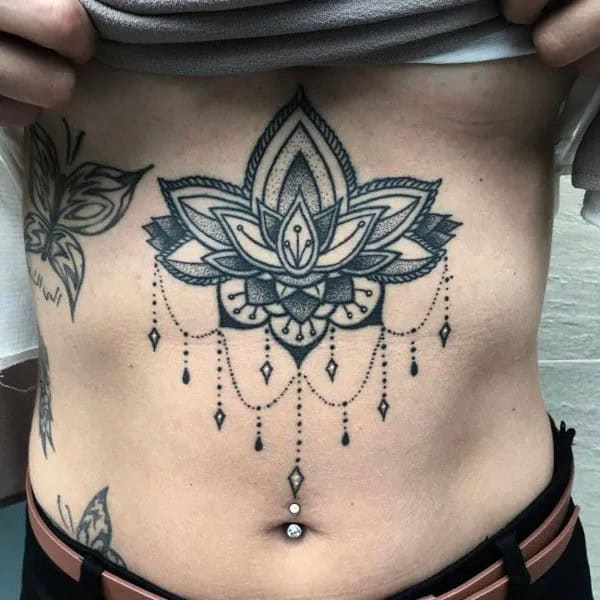 Lotus Sternum Tattoo