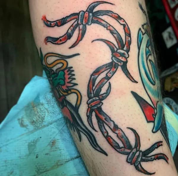 Current Status In Pop Culture: Are Barbed Wire Tattoos Back In Business?