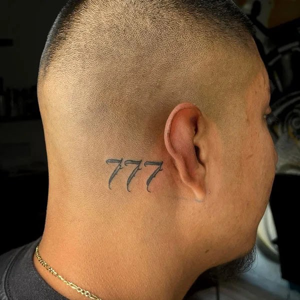 Behind the ear 777 Tattoo