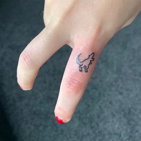 Dinosaur Finger Tattoo