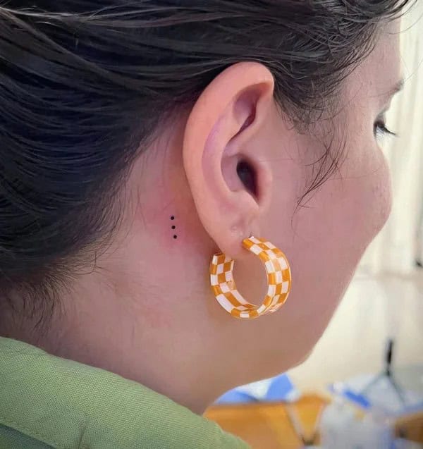 Three Dots Tattoo Behind the Ear