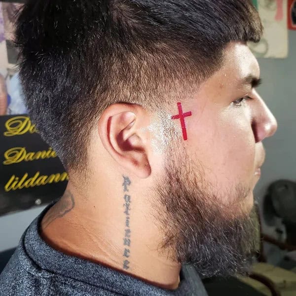 Face Cross Tattoo