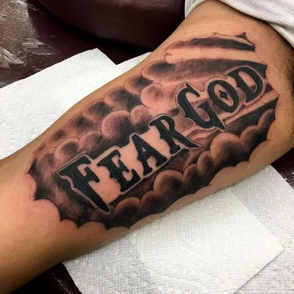 Fear God Tattoo on Bicep