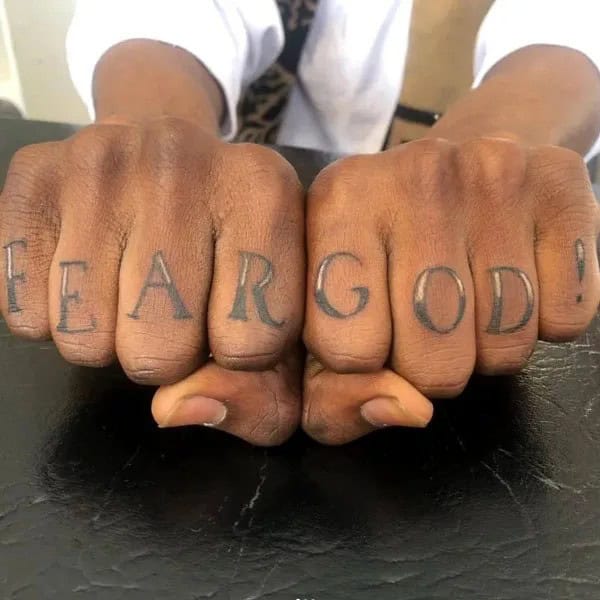 Fear God Tattoo on Finger