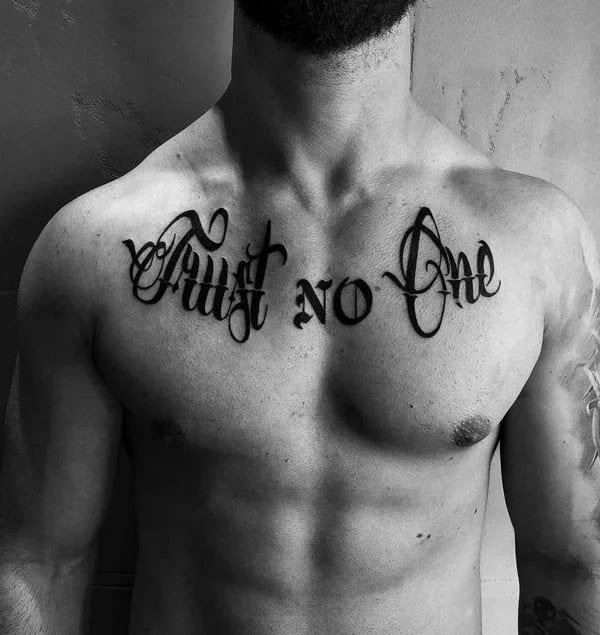 “Trust No One” Chest Tattoo