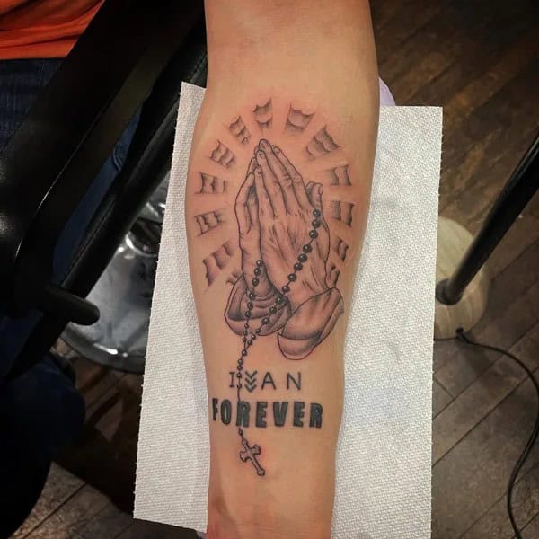 Religious Forearm Tattoo