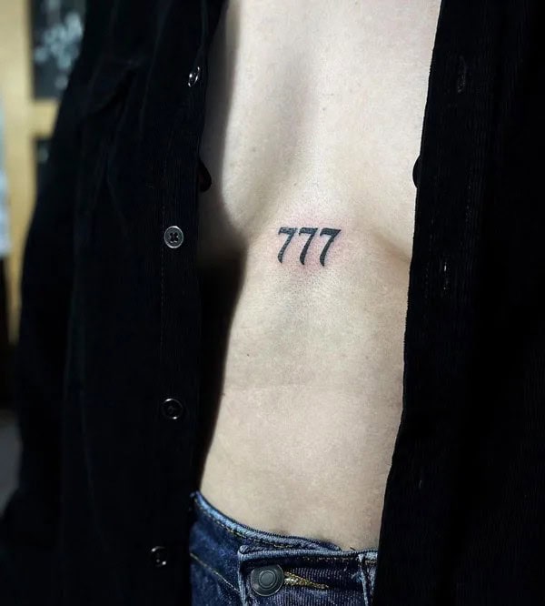 Behind the ear 777 Tattoo