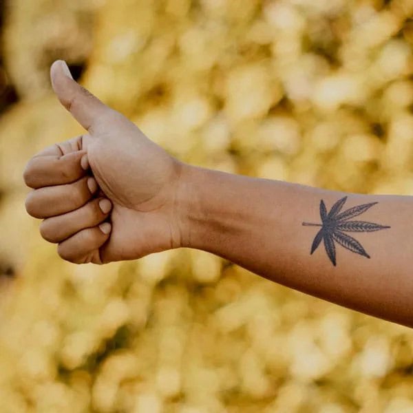 Weed Hand Tattoo