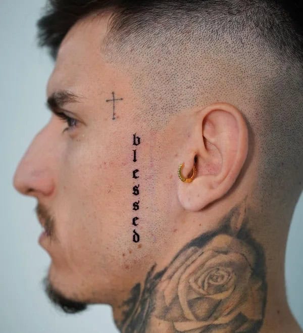 Face Cross Tattoo