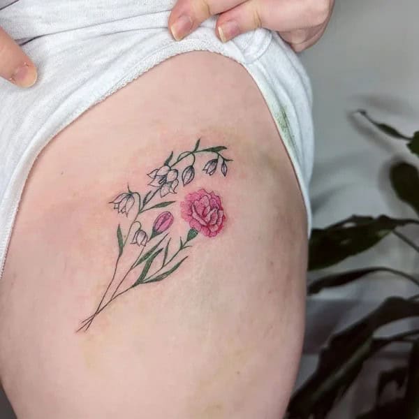 January Birth Flower Thigh Tattoo