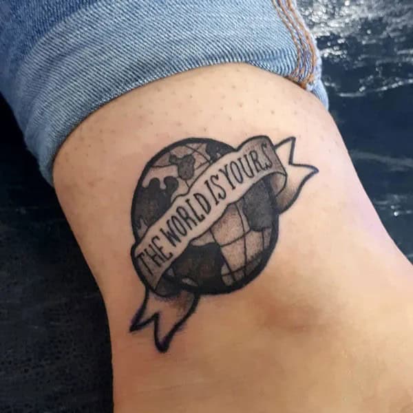 “The World Is Yours” Finger Tattoo