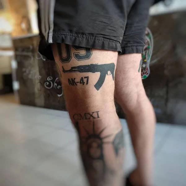 AK-47 Thigh Tattoo