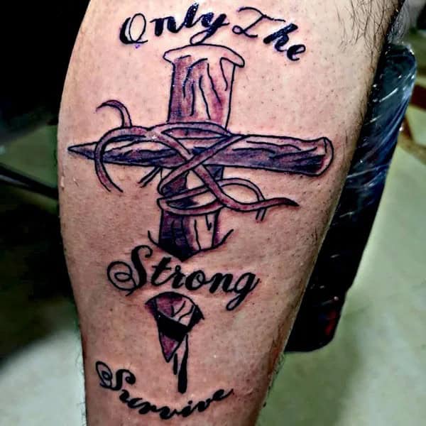 “Only The Strong Survive” Tattoo with a Cross