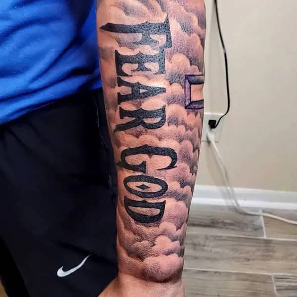 Fear God Tattoo on Forearm