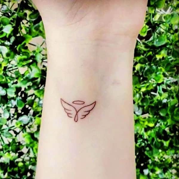 Semicolon Tattoo with Wings