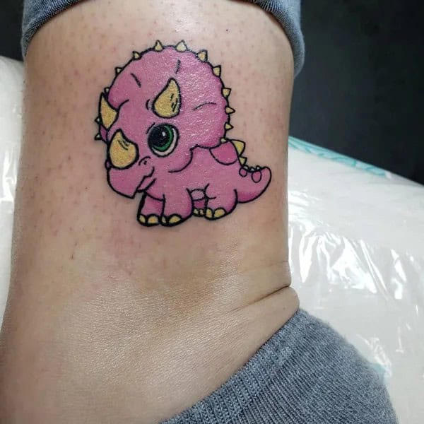 Cartoon Dinosaur Tattoo