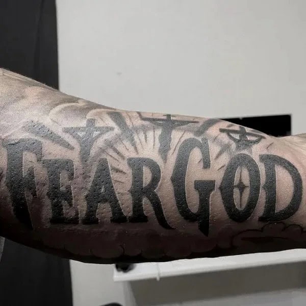 Fear God Tattoo on Bicep