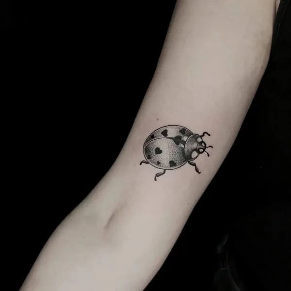 Black and White Ladybug Tattoo