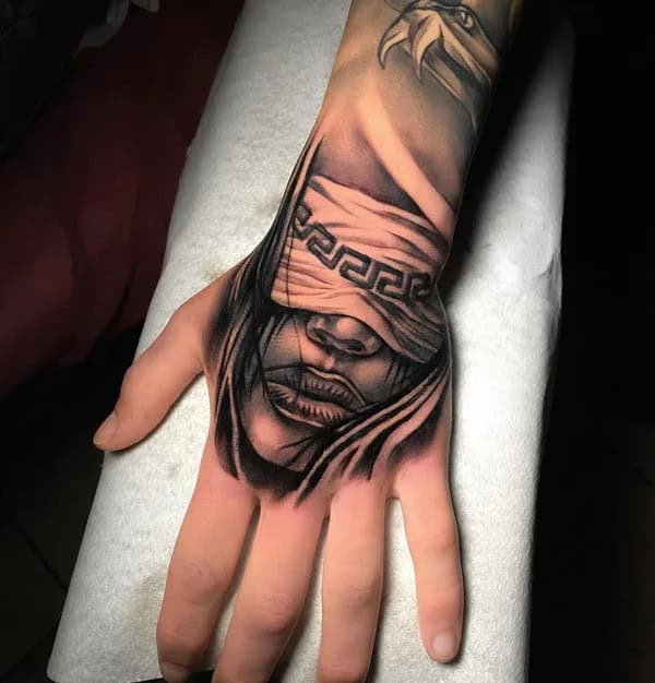 Chicano Hand Tattoo