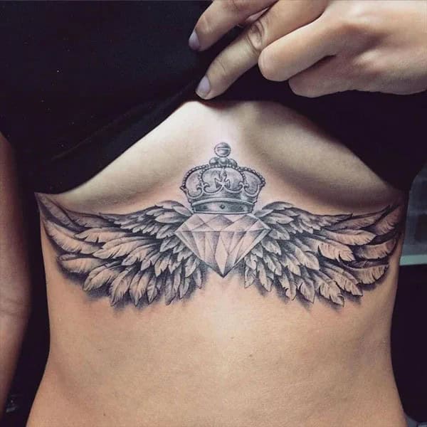 Wings Under Breast Tattoo